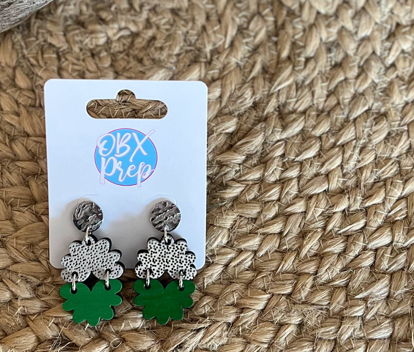 Hand-Painted Floral-Shaped St. Patrick's Day Wood Earrings with Polka Dot and Green Design.